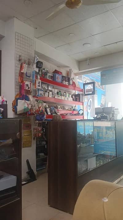 running mobiles and  laptops  shop available for sale at DHA 2 Islamad