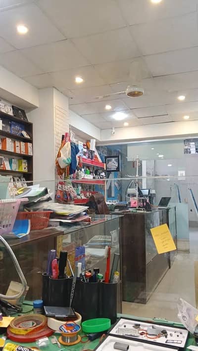 running mobiles and  laptops  shop available for sale at DHA 2 Islamad