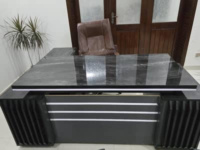 execitive table and sofas and tables