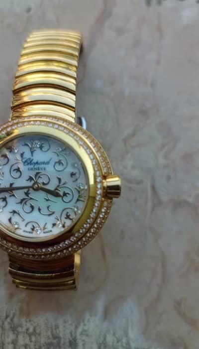 luxury diamond watch from the Chopard Happy Diamonds collection.