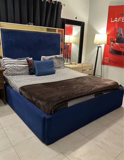 Royal blue king sized bed