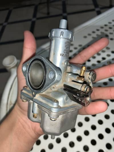 125 Carburettor original koi fult nhi
