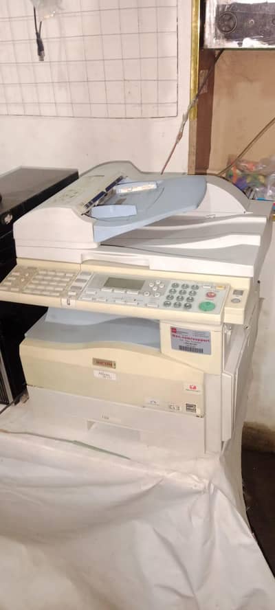 photocopy plus scaner masheen