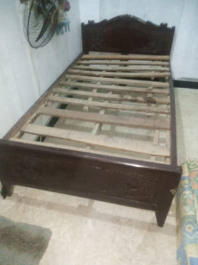single wooden bed