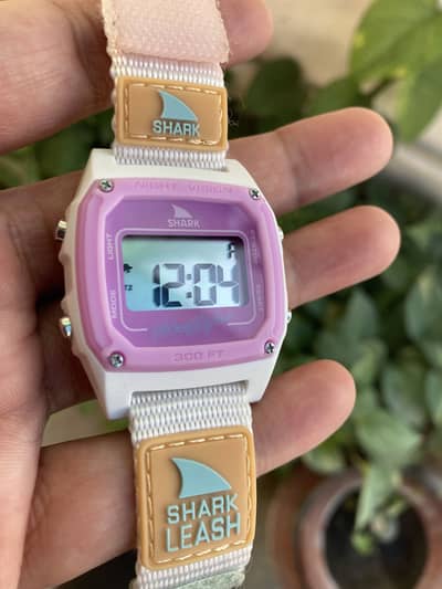 Freestyle Shark Classic Leash is a water-resistant digital watch