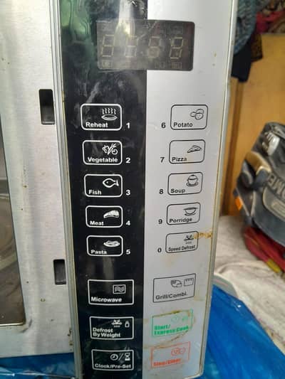 Kenwood MW757 Microwave Oven with Grill 1000W /25L