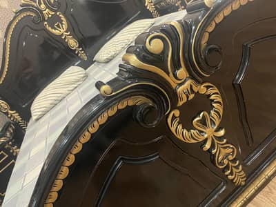 bed and dressing tables