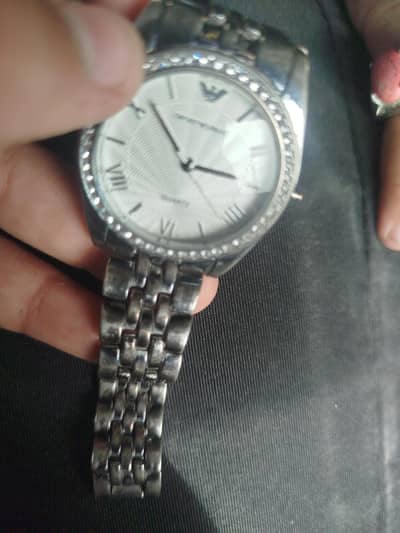 bro this is of emprio Armani watch new quartz  silver chain and white
