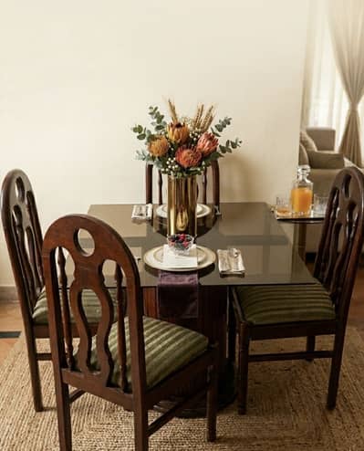 4 seater wooden Dining table glass top