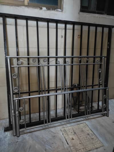 rod iron double bed with side tables glazed paint almost new