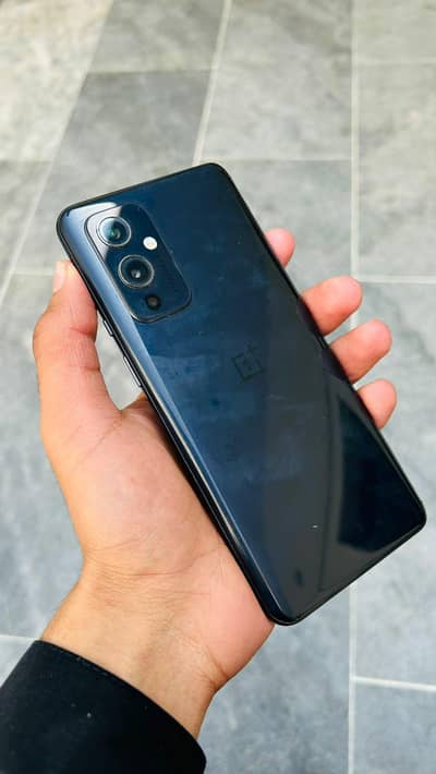 One Plus 9 5G . . . 8/128 . . . .