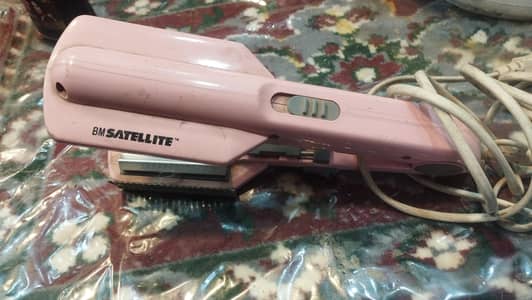hair straightner and crimper two in one.