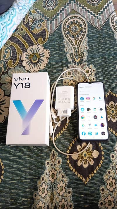 vivo y18 10/10 4 gb ram 128 gb rom original charger with box