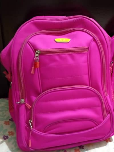 1 pink color school bag