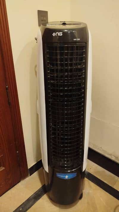 Air Cooler, Barely used. Warranty card attached.