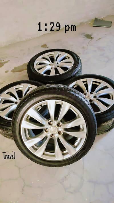 18 inch rims for sale with tyre  tyre condition  50 % hai