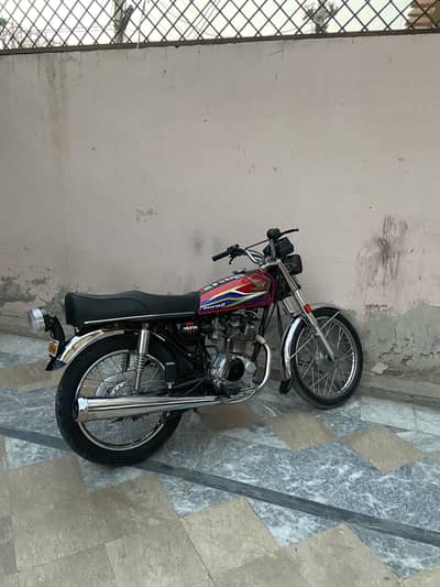 Honda CG125 silencer and bracket