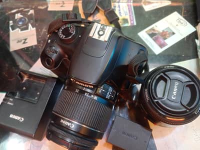 Canon 1300D with 18-55mm lense and accessories