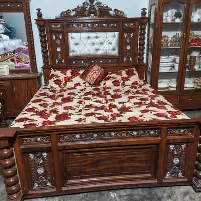 bed pure wood ka bana hoa hai side table  and dressing satha hai