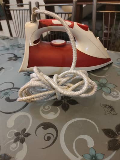 2 Pcs of iron  < Brands :- Black and Deacker & Philips >