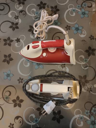 2 Pcs of iron  < Brands :- Black and Deacker & Philips >