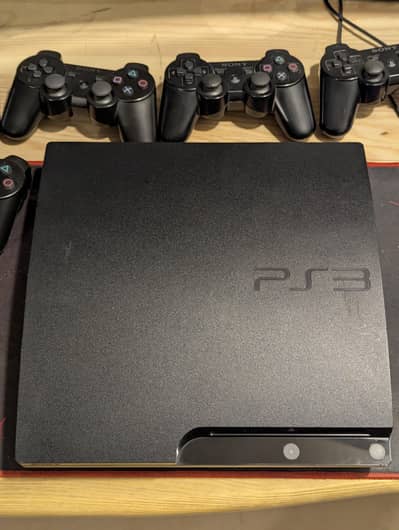 PS3 Slim 320GB Jailbreaked – 5 Controllers – 14 to 16 games
