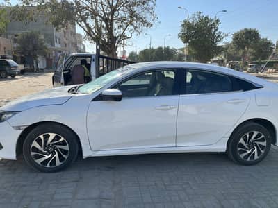 I am selling My honda Civic UG