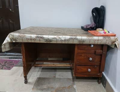 Wooden Office table with considerable space in affordable price.