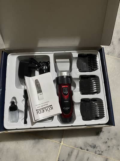 Shaving machine trimmer