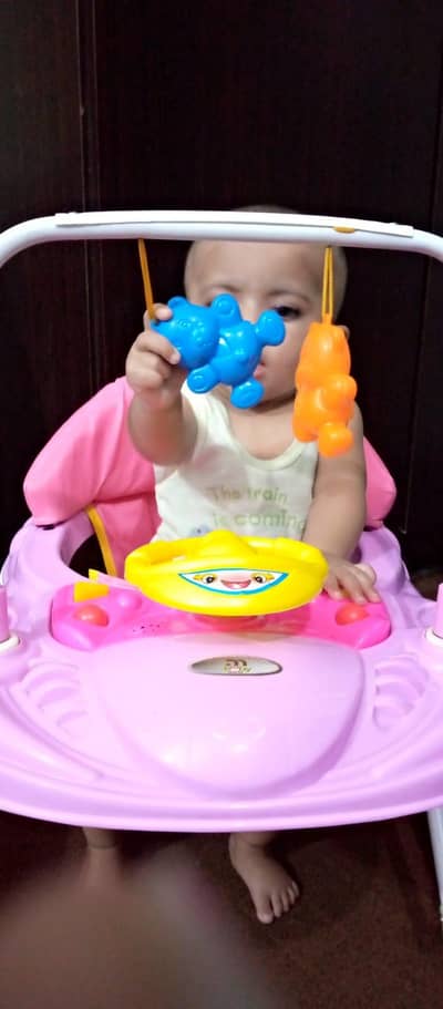 baby walker with toys rack