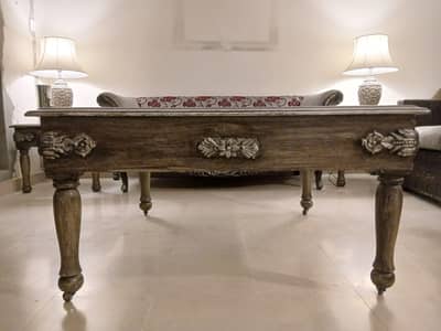 glass top centre table with two side tables