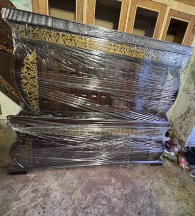 Wooden bed set for sale.