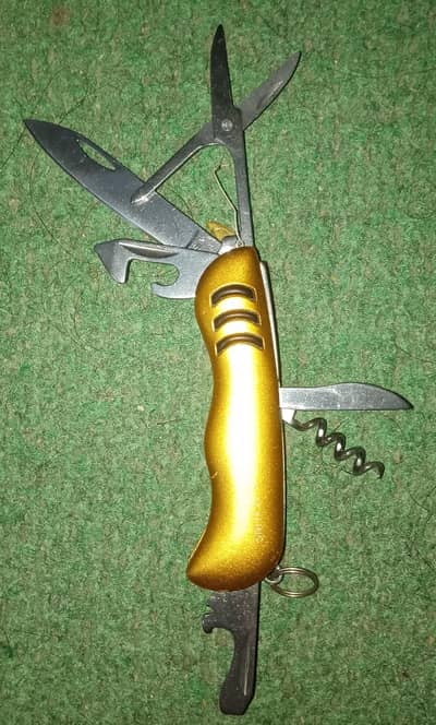 6 in one Swiss Army style Multi Tool Pocket Knife.