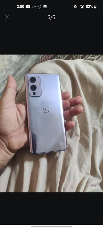 One Plus 9 dual sim  5G all sim working 8/128 just Line no any fault