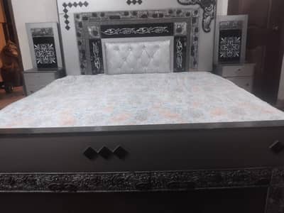 king size bed with side tables and showcase and Crockery Cabinet