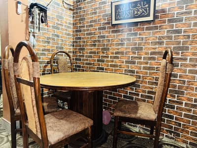 Wooden Dining table and 4 wooden chairs available