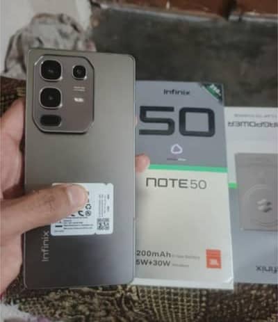 infnix not 50 with box charger condition 10/10