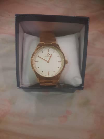 selling wrist gold watch