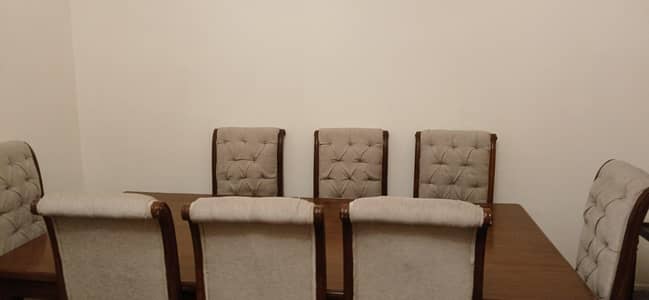 Elegant 8 seater dining table set with cushioned chairs, Good conditio