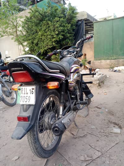 Honda prider black colour.