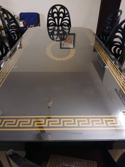 8 seater dinning solid wood with glass included