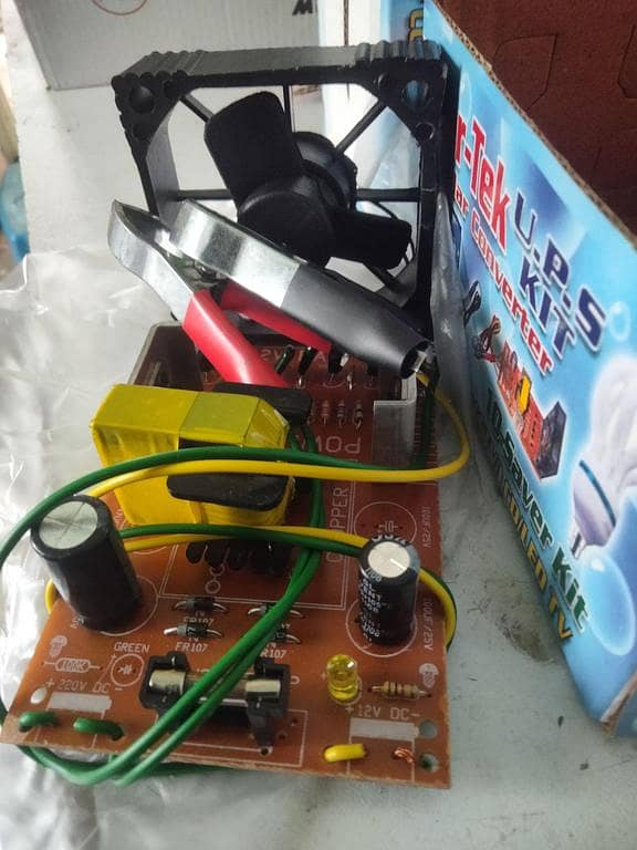 mini UPS inverter kit designed to convert 12V DC input to 220V AC output.  ( TV souldring iron led lights cctvcamra )