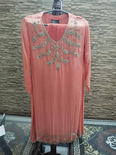 two dresses for sale :Dress 1 Pink Dress 2 Peach with Stone work