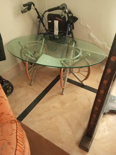 1 center table with two side tables. .