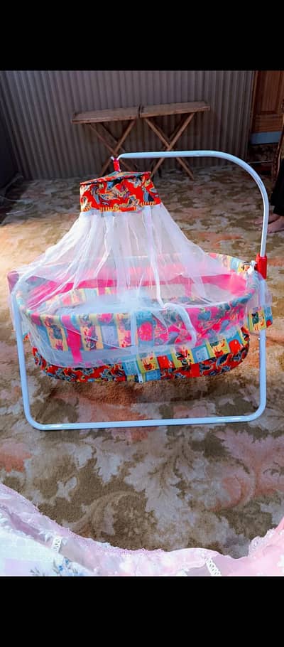 Baby swing with mosquito net.