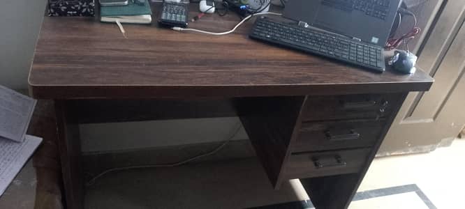 Office table brown wooden and office chair black