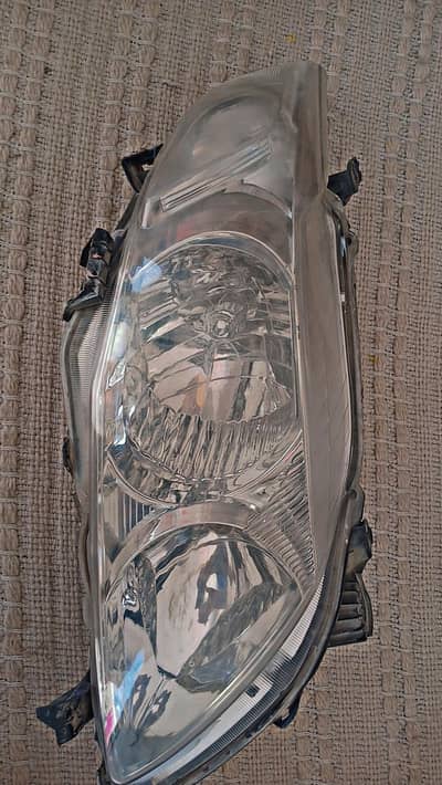 Corolla Gli 2010 Headlight + Tail Lights + Bumpers