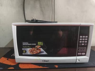 Clickon Microwave Oven – Fast Heating | Excellent Condition | Home Use