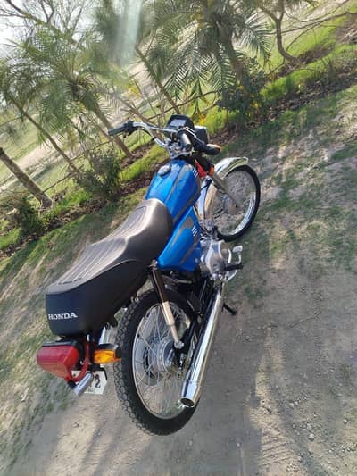 Honda CD 70 total genuine condition with  original parts .