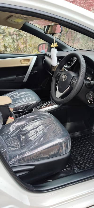 Toyota Altis 1.6 total geniun mobile num 03054067320